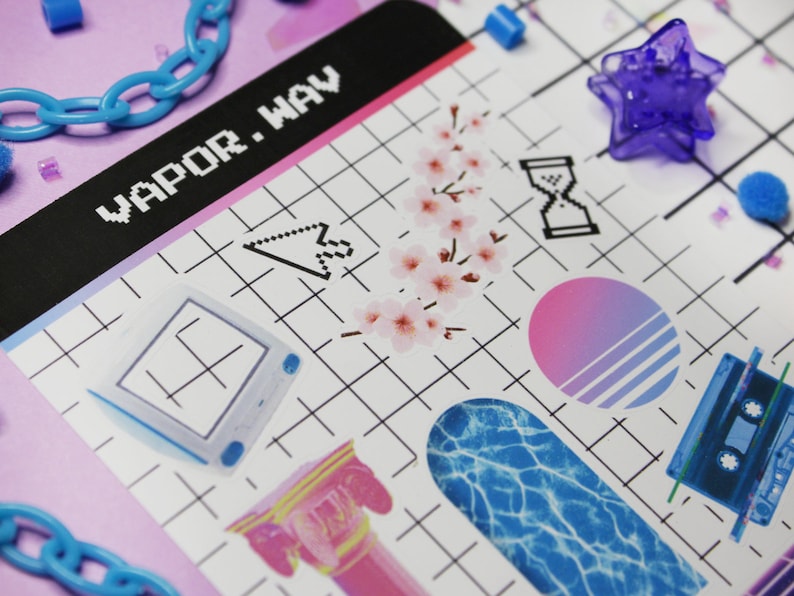 close up of vaporwave sticker sheet with, retro computer, cherry blossom branch, and other vaporwave elements