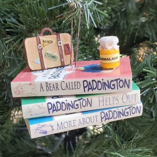 Paddington bear book ornament with suitcase and marmalade jar. Customize by adding an extra book, with person's name and/or year.