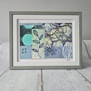 small mixed media collage with stitch detail