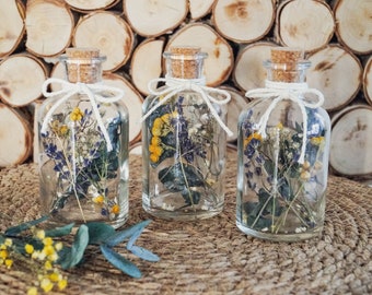 Dried flowers in a jar filled with a cork glass bottle gift idea - DecoPanda