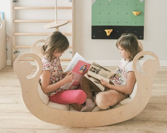 Balancín de madera Montessori con arco para trepar y almohada.