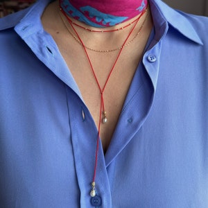 Red string necklace with pearl