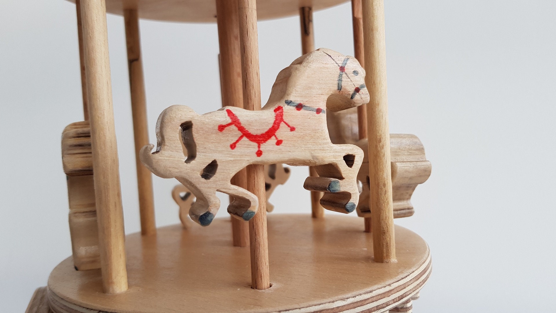 Wooden sales carousel toy