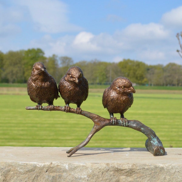 Bronze sculpture of 3 sparrows