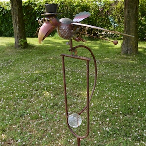 Garden plug with flying raven image 1