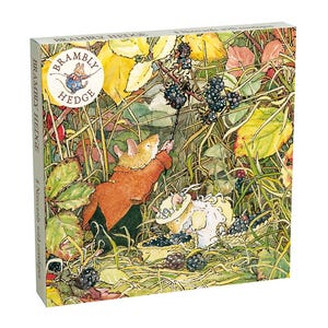 May include: A square box set of 8 notecards with envelopes featuring the Brambly Hedge illustration of two mice gathering blackberries in a field of green and yellow foliage. The box displays the Brambly Hedge logo and text on the front.