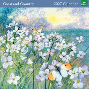 May include: A 2027 wall calendar titled Coast and Country featuring a painted illustration of white wildflowers and orange-tipped butterflies in a meadow at sunrise. The top banner includes the text Coast and Country 2027 Calendar.