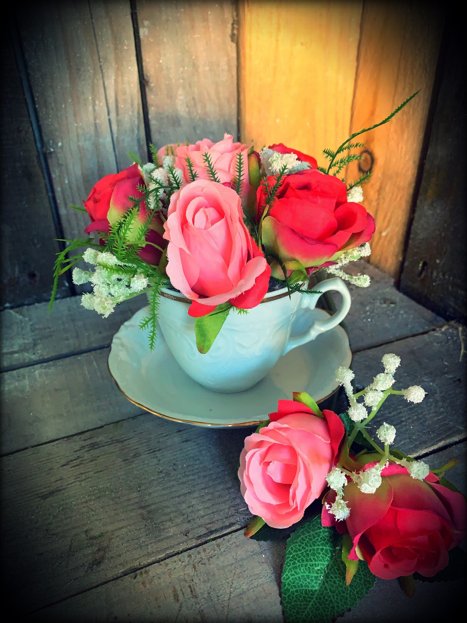 Silk flower arrangement in a cup and saucer Etsy