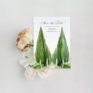 May include: Save the Date card with a watercolor illustration of a pathway lined with cypress trees. The text reads "Save the Date" with the names "Kathryn & Jameson" and the date "10.20.23" and location "Lombardy, Italy".