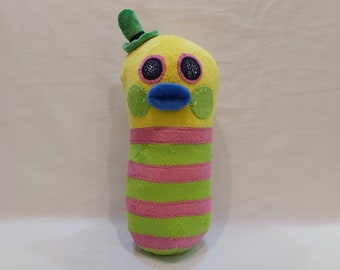 Mr. Dinkles is Biggie's pet worm from the Trolls 11,8” (30 cm) Plush Toy Snack Pack