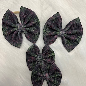 Halloween webs bows on nylon, clips & piggies