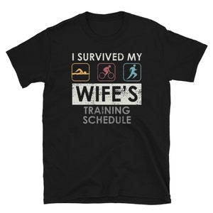 Survived my Wife's Training Schedule Triathlete T-Shirt