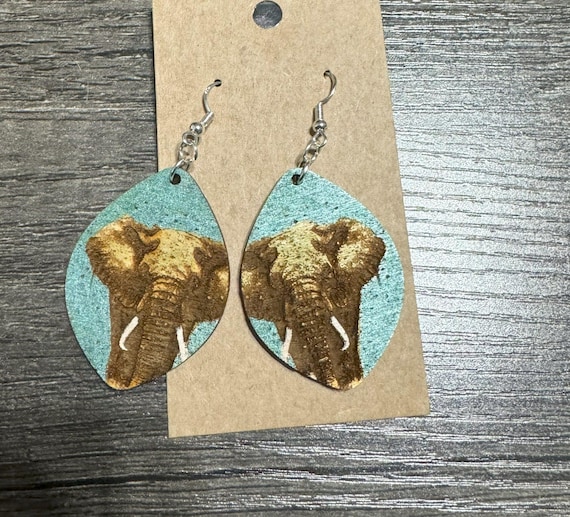 Engraved Elephant Earrings with Shimmery Background