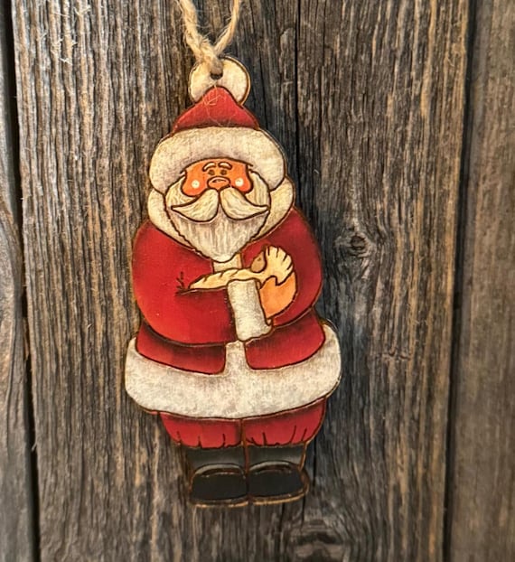 Little Multicultural Santa Holding Baby Jesus Ornaments