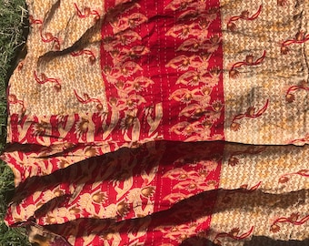 Sofa top red and beige kantha bedspread on one side and burgundy and yellow on the other