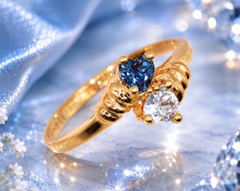 Anello vintage Toi et Moi in oro 10 carati con alessandrite a taglio a cuore e topazio blu. Anello bypass.