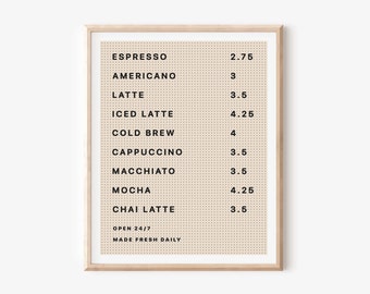 May include: A beige menu board with black text listing coffee drinks and prices. The menu includes espresso, americano, latte, iced latte, cold brew, cappuccino, macchiato, mocha, and chai latte. The board also states "Open 24/7" and "Made Fresh Daily".