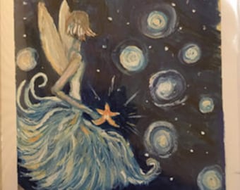 May include: A blue fairy with a white dress and wings flies through a dark blue night sky with white stars. The fairy holds a yellow starfish in her hand. The text "Wishing you a Fairy Merry Christmas" is written at the bottom of the image.