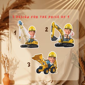 May include: Three yellow construction vehicle designs with a child's face in the driver's seat. The designs include a crane, excavator, and a front-end loader. The text at the top reads "3 DESIGN FOR THE PRICE OF 1".