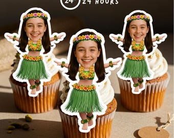 May include: Three cupcakes topped with white frosting and decorated with cutouts of a smiling person in a hula outfit. The cutouts have a green grass skirt, flower lei, and flower crown. The text "READY IN 24 HOURS" is in a circle above the cupcakes.