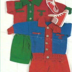 May include: A knitted children's outfit in red and blue, with green shorts. The red outfit has a green collar and trim, with matching red shoes. The blue outfit has red trim and a small boat design. The text "me" is visible.