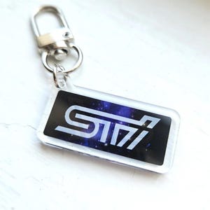 GALAXY STI - porte-clé Subaru Galaxy - porte-clé de voiture JDM - porte-clé espace violet - cadeau pour amateur de voiture - cadeau pour garagiste - Subaru wrx