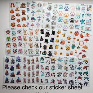 May include: A collection of sticker sheets featuring various designs. The stickers include autumn-themed images like pumpkins and mushrooms, cute animals, bees, books, penguins, and turtles. The text "Please check our sticker sheet collection" is at the bottom.
