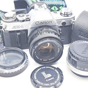 Canon AE-1 SLR Film Camera w/ Canon FD 50mm f1.8, Vivitar Automatic 2x-4 Tele Converter & More