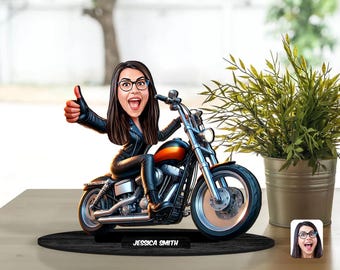 May include: A caricature of a person with brown hair and glasses riding a black and orange motorcycle. The motorcycle has a black base and the name "Jessica Smith" is written on it.