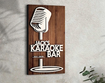 May include: A wooden sign with a microphone graphic and the text "Jack's Karaoke Bar Est. 2018".