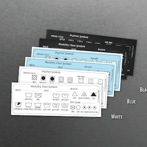 Puede incluir: Cuatro tarjetas con s&iacute;mbolos de lavander&iacute;a para lavar, secar y planchar. Las tarjetas est&aacute;n etiquetadas como "Lavar", "Ciclo de secado", "Calor" y "Blanqueador". Las tarjetas est&aacute;n apiladas una encima de la otra, con la tarjeta superior blanca, la segunda tarjeta azul, la tercera tarjeta negra y la tarjeta inferior negra.