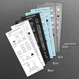 Puede incluir: Un conjunto de cinco tarjetas con s&iacute;mbolos de cuidado de la ropa impresos en ellas. Las tarjetas son de diferentes colores: blanco, negro, azul, plateado y gris. Las tarjetas est&aacute;n etiquetadas con los colores en la parte inferior. El texto "LIMITED EDITION*" est&aacute; impreso en la tarjeta plateada.