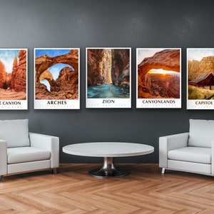 May include: Five framed posters of different national parks in the United States. The posters feature scenic views of Bryce Canyon, Arches, Zion, Canyonlands, and Capitol Reef National Parks.