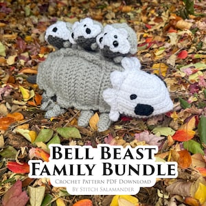 May include: A crocheted grey Bell Beast family bundle, featuring a large body with three smaller heads and one larger head. The heads are white with black accents. The text "Bell Beast Family Bundle" and "Crochet Pattern PDF Download by Stitch Salamander" is visible.