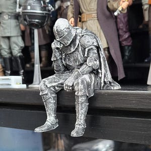 Sad Knight Sitting on a Ledge Shelf Sitter ornament unique oddity gift idea