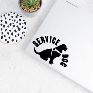 May include: Black and white sticker of a service dog with a harness and the text "SERVICE DOG" in a semi-circle around the dog.