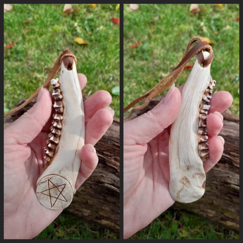 Roe deer bone pendant with intricate handcarved pattern