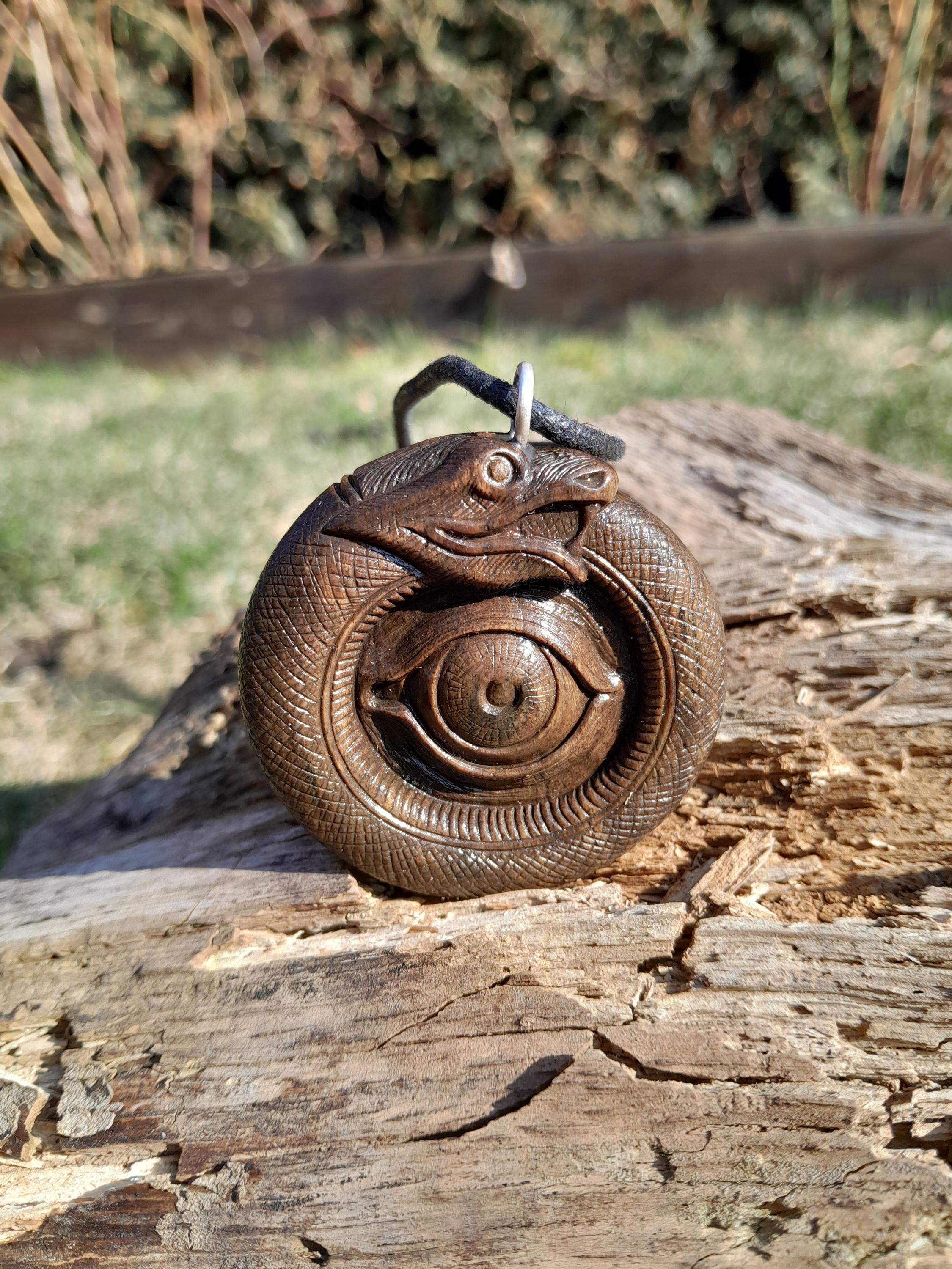 Hand-carved Beautiful Viking Ouroboros and All Seeing Eye amulet. Historical world snake jewelry. The ancient symbol of Providence.