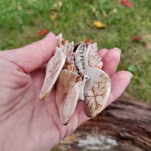 Natural bone pendant with traditional Viking design