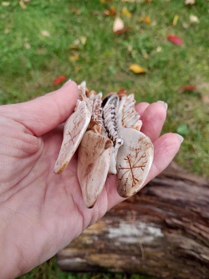 Natural bone pendant with traditional Viking design