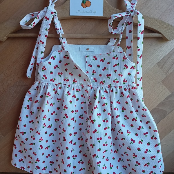 Robe bébé, enfant, en piqué de coton imprimé cerises