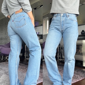 w28 L33 Levis 501 vintage medium blue straight leg Levi’s 501 made in Spain 90s vintage Levi’s 501