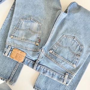 Levis 501s  vintage w31 L29 medium faded blue 501s made in USA 80s straight leg jeans 501 30”/31” waist hol