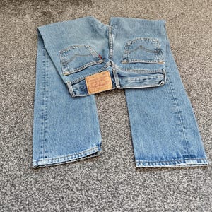 Levis 501 vintage w23 L29 Levi’s 501 light faded blue 90s Levi’s blue straight leg blue 501 vintage blue 501 worn vintage Levi’s