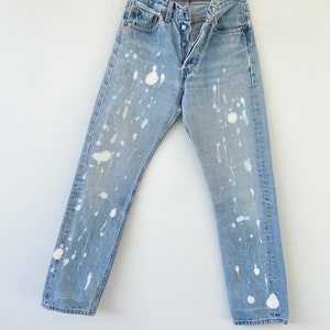Vintage Levi’s 501  w25” L29” made in USA for women tag bleached 90s Levi’s 501s distressed Levis