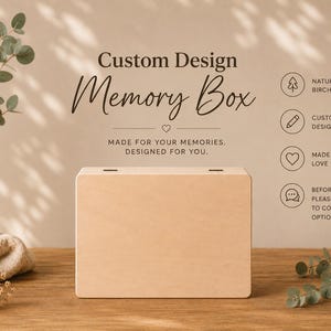 May include: A rectangular light-coloured wooden memory box with two dark hinges on the top edge. The text reads Custom Design Memory Box, Made for your memories. Designed for you. Icons indicate natural birch wood, custom design, and love.