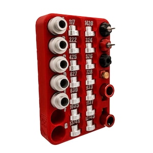 May include: A red plastic tool organizer with a variety of silver metal tools and a few red and gold tools. The organizer has numbers printed on it, including 117, 1420, 222, 324, 425, 526, 627, 128, 830, 933, 1035, 1137, 13/41, and 12/45.