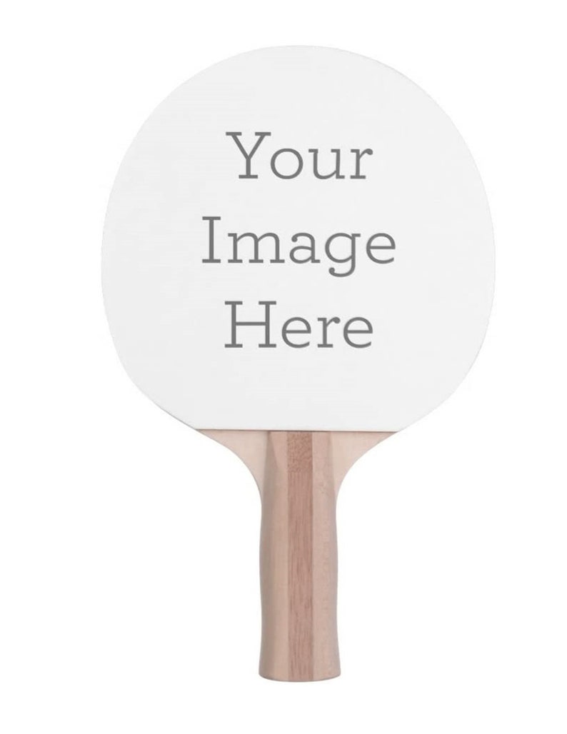 May include: A white ping pong paddle with a wooden handle. The paddle has the text "Your Image Here" printed on it.