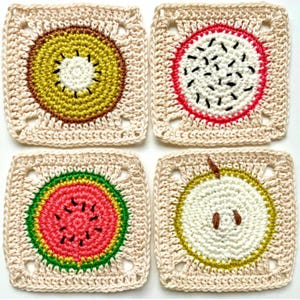 May include: Four square crochet coasters with fruit designs. The coasters feature a kiwi, dragon fruit, watermelon, and pear. Each coaster has a beige border and a colourful fruit centre, perfect for adding a touch of whimsy to any table setting.
