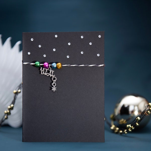 Handmade Christmas card with silver 'Let it snow' charm